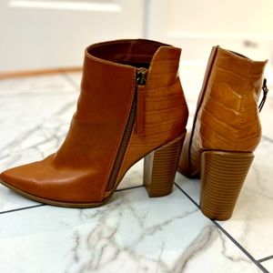 Pointed toe booties- snakeskin on back